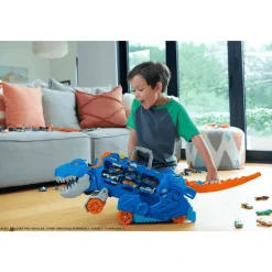 Hot Wheels City Camión tráiler Camión que se transforma en Tiranosaurio Rex pisoteador con pista de
